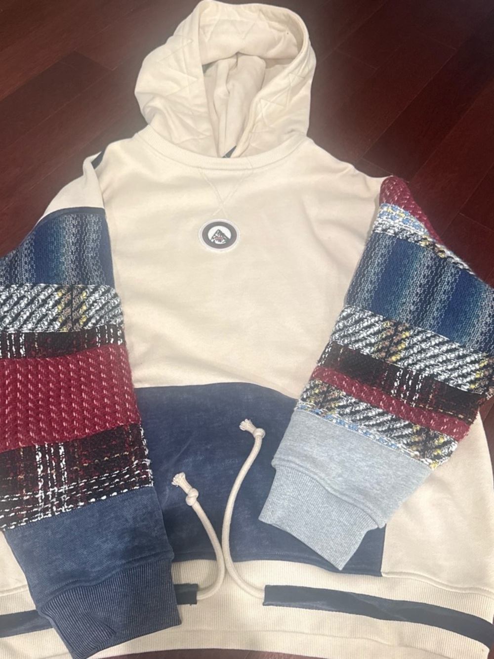 Kith Cream Hoodie with Multicolor Pathwork Plaid Sleeves